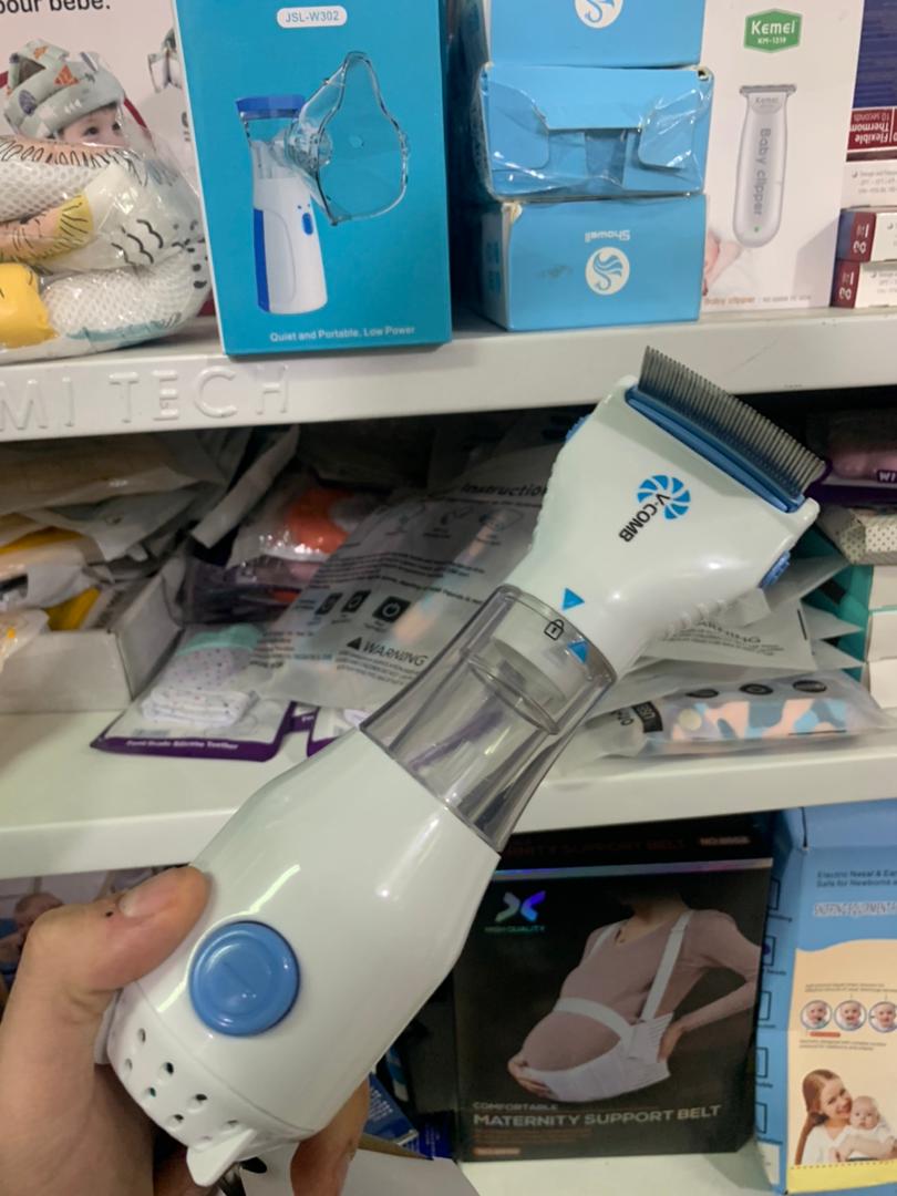 Comb Peigne Anti-Poux Électrique & Nettoyeur Cheveux - Électronique - صورة حقيقية 10