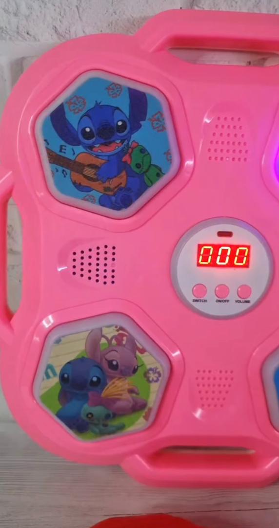 Machine de Boxe Stitch Musicale Rose – آلة الملاكمة الموسيقية للأطفال - Jouet & Gaming - صورة حقيقية 6