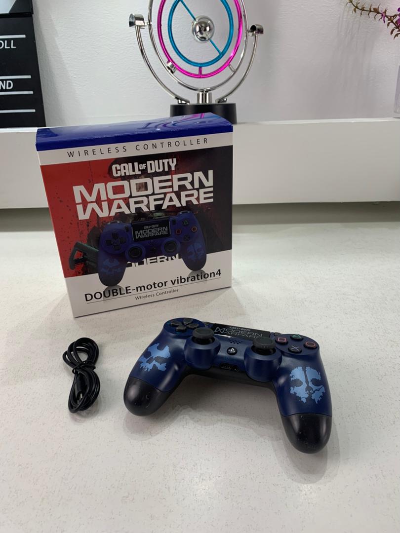 SONY DualShock Manette PS4 Sans Fil, Batterie Rechargeable (High Copy) – Edition Moderne Warfare - Jouet & Gaming - صورة 6