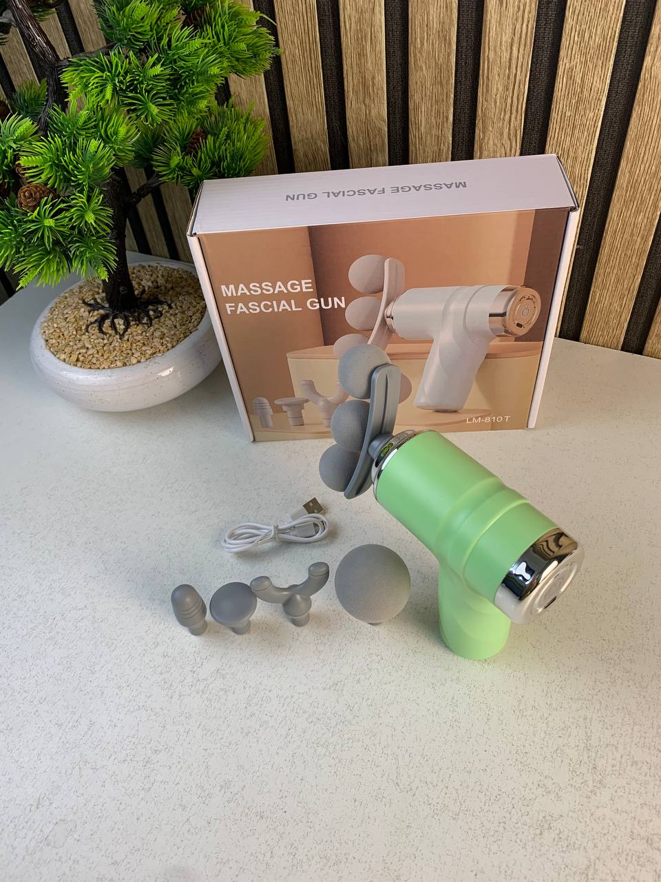 Pistolet de massage pour soulager la douleur 6 vitesses 4 têtes LM-810T - جهاز تدليك بعدة رِؤوس - Électronique - صورة حقيقية 12