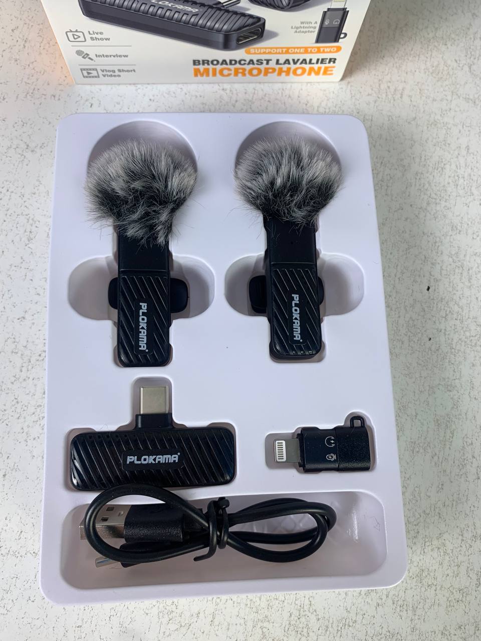 Microphone cravate sans fil Plokama VM-20 2,4 GHz - ارتقِ بصوتك إلى المستوى الاحترافي مع ميكروفون اللاسلكي المزدوج - Électronique - صورة حقيقية 10